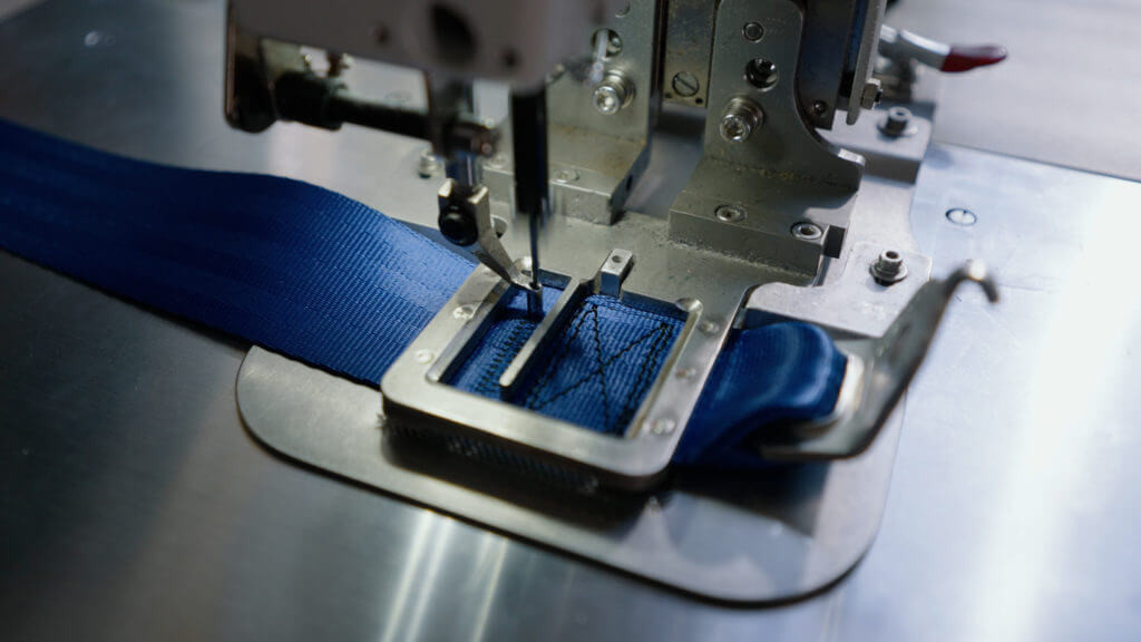 custom-colored seatbelt stitching process
